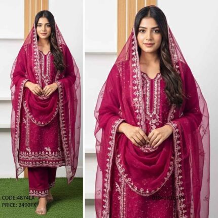 A woman wearing an exclusive magenta georgette embroidery work three piece suit with an elegant dupatta, product code 4874LA
