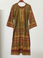 An olive green premium cotton screen printed stitched three-piece dress showcasing gorgeous colorful traditional embroidery on the neckline, with matching kota cotton dupatta and cotton trousers.