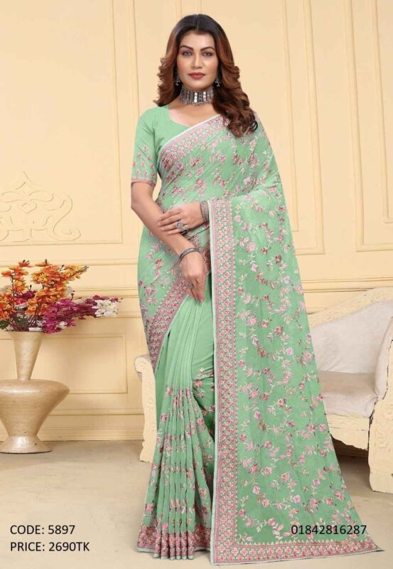 Mint green soft georgette saree featuring intricate floral embroidery and sequence work all over, paired with a matching un-stitched blouse piece. (Code: 5897)